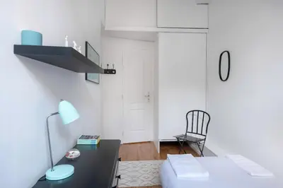 Un ou plusieurs lits dans un hébergement de l'établissement Bel appartement proche de la Place Graslin