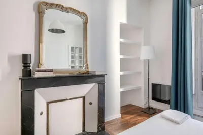 Un ou plusieurs lits dans un hébergement de l'établissement Bel appartement proche de la Place Graslin