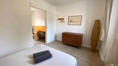 Un ou plusieurs lits dans un hébergement de l'établissement Maisonnette duplex
