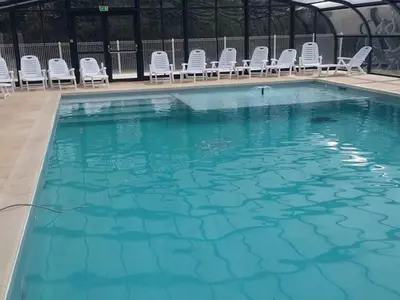 Piscine de l'établissement Mobil-home confortable avec terrasse pour 4 personnes - API-1-52-1361 ou située à proximité