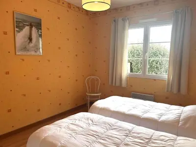 Un ou plusieurs lits dans un hébergement de l'établissement HI000-C24 Mais 5 pièces 8 couchages SAINT HILAIRE DE RIEZ