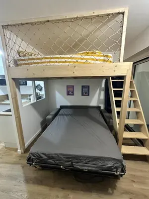 Un ou plusieurs lits dans un hébergement de l'établissement Appartement Pornic plage Noëveillard à pied