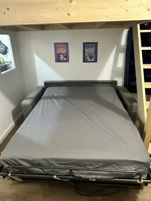 Un ou plusieurs lits dans un hébergement de l'établissement Appartement Pornic plage Noëveillard à pied