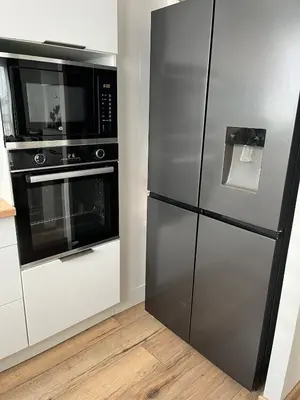 Cuisine ou kitchenette dans l'établissement Bright apartment