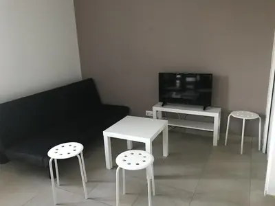Télévision ou salle de divertissement dans l'établissement La maison de la chaussée