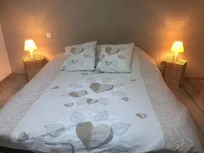 Un ou plusieurs lits dans un hébergement de l'établissement La maison de la chaussée