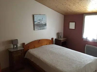 Un ou plusieurs lits dans un hébergement de l'établissement Maison calme et agréable proche de la mer