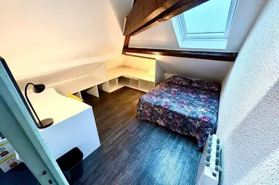 Un ou plusieurs lits dans un hébergement de l'établissement Appartement lumineux idéal pour 4 à Nantes