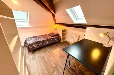 Un ou plusieurs lits dans un hébergement de l'établissement Appartement lumineux idéal pour 4 à Nantes
