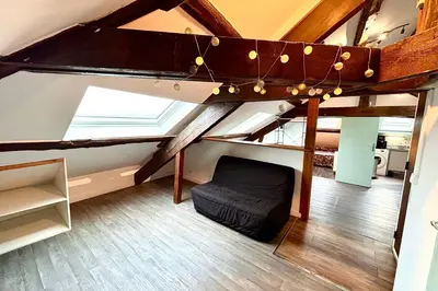 Un ou plusieurs lits dans un hébergement de l'établissement Appartement lumineux idéal pour 4 à Nantes