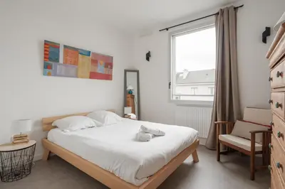Un ou plusieurs lits dans un hébergement de l'établissement Bel Appartement 80m2 - 2 Parkings - Ile de Nantes
