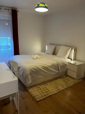 Un ou plusieurs lits dans un hébergement de l'établissement Beautiful apartment located in a quiet residence
