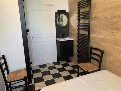 Un ou plusieurs lits dans un hébergement de l'établissement MAISON ARZAEL à SAINT MARC SUR MER