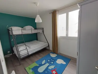 Un ou plusieurs lits dans un hébergement de l'établissement T3 lumineux à deux pas de la plage