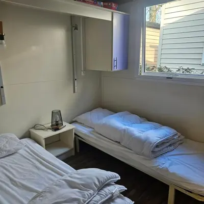 Un ou plusieurs lits dans un hébergement de l'établissement Chalet KABANA