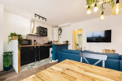 Cuisine ou kitchenette dans l'établissement la deferlante - front de mer - centre - parking
