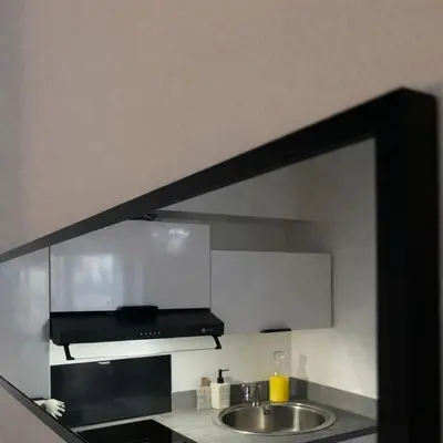 Cuisine ou kitchenette dans l'établissement Studio de charme avec cheminée décorative