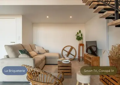 Coin salon dans l'établissement Idéal Pro - Wifi haut débit - Tout inclus - Commodités 5 mn