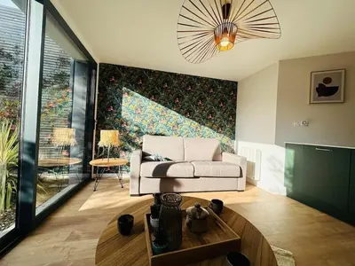 Coin salon dans l'établissement Casa Belfort T2 avec Jardin