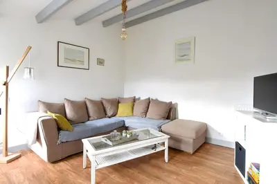 Télévision ou salle de divertissement dans l'établissement Maison conviviale pour 8 avec jardin à Noirmoutier