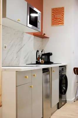 Cuisine ou kitchenette dans l'établissement charmant studio - coeur de ville - 2 personnes