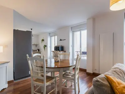 Télévision ou salle de divertissement dans l'établissement Duplex calme proche plage, parking sécurisé, petit animal accepté - FR-1-306-1322
