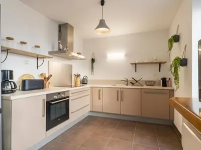 Cuisine ou kitchenette dans l'établissement Duplex calme proche plage, parking sécurisé, petit animal accepté - FR-1-306-1322