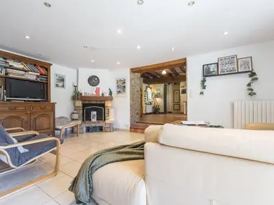 Coin salon dans l'établissement Gîte calme proche Nantes, idéal famille, WiFi, animaux bienvenus - FR-1-306-1323