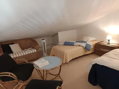 Un ou plusieurs lits dans un hébergement de l'établissement Maison conviviale près plage et forêt, parking - FR-1-540-328