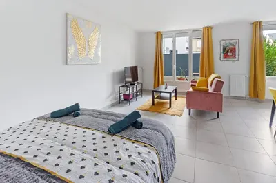Un ou plusieurs lits dans un hébergement de l'établissement Le Petit Patio proximité clinique Jules Verne
