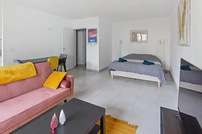 Un ou plusieurs lits dans un hébergement de l'établissement Le Petit Patio proximité clinique Jules Verne