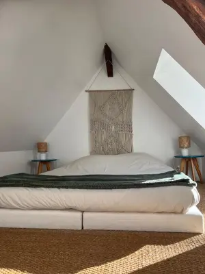 Un ou plusieurs lits dans un hébergement de l'établissement Studio indépendant chez l'habitant