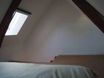 Un ou plusieurs lits dans un hébergement de l'établissement Studio indépendant chez l'habitant