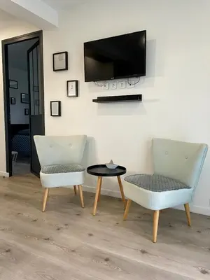 Télévision ou salle de divertissement dans l'établissement T3 Escapade bord de mer