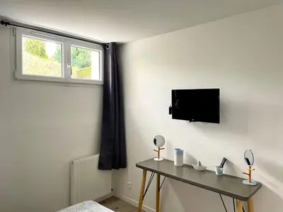 Télévision ou salle de divertissement dans l'établissement T3 Escapade bord de mer