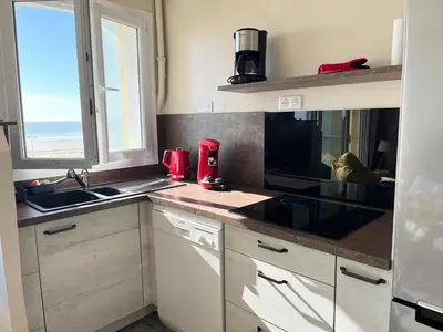 Cuisine ou kitchenette dans l'établissement Le Navire