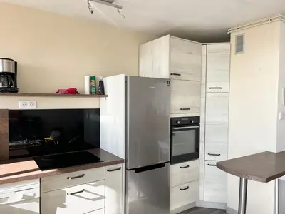Cuisine ou kitchenette dans l'établissement Le Navire