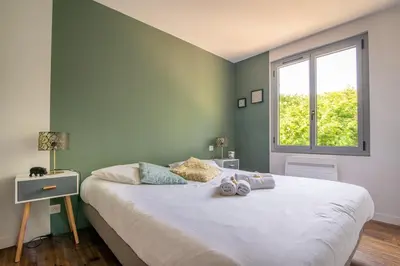 Un ou plusieurs lits dans un hébergement de l'établissement Le Vue sur Moine, pratique et proche du PuyduFou