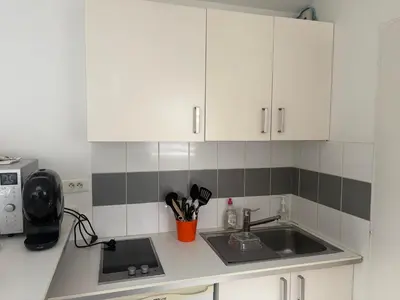 Cuisine ou kitchenette dans l'établissement Cocon