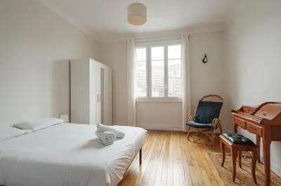 Un ou plusieurs lits dans un hébergement de l'établissement Appartement Spacieux et Lumineux en Centre-Ville