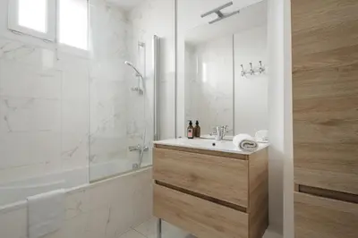 Salle de bains dans l'établissement Appartement Spacieux et Lumineux en Centre-Ville