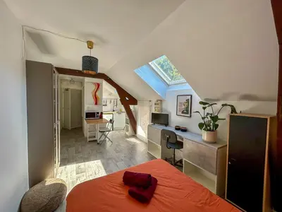Un ou plusieurs lits dans un hébergement de l'établissement Studio Bord de Loire - Couëron