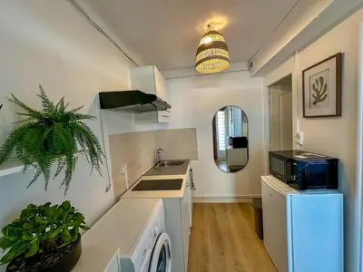 Cuisine ou kitchenette dans l'établissement Studio proche Zenith & Atlantis