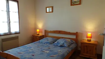 Un ou plusieurs lits dans un hébergement de l'établissement NO000-A10 Maison 3 pièces NO 6 couchages NOIRMOUTIER EN L'ILE