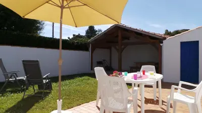 Jardin de l'établissement NO000-A10 Maison 3 pièces NO 6 couchages NOIRMOUTIER EN L'ILE