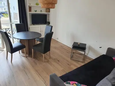 Télévision ou salle de divertissement dans l'établissement Résidence le grand Hôtel