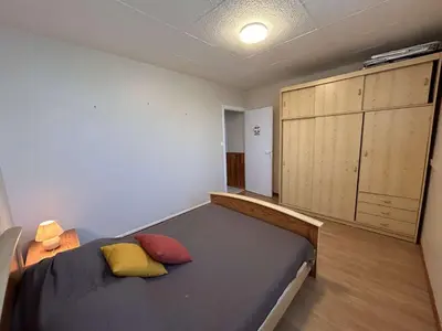 Un ou plusieurs lits dans un hébergement de l'établissement Appartement proche plage, balcon, parking privé - FR-1-224C-364