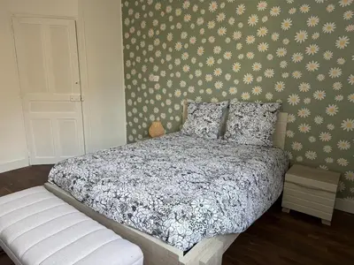 Un ou plusieurs lits dans un hébergement de l'établissement Maison sur les hauteurs de la ville