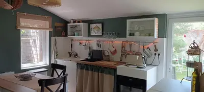 Cuisine ou kitchenette dans l'établissement Petite Rimb