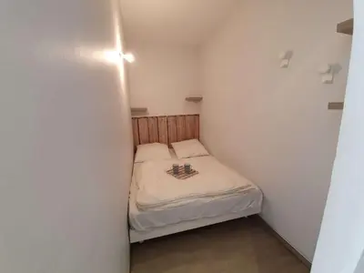 Un ou plusieurs lits dans un hébergement de l'établissement SJ490-052 - Appart Studio cabine 4 couchages - SAINT JEAN DE MONTS